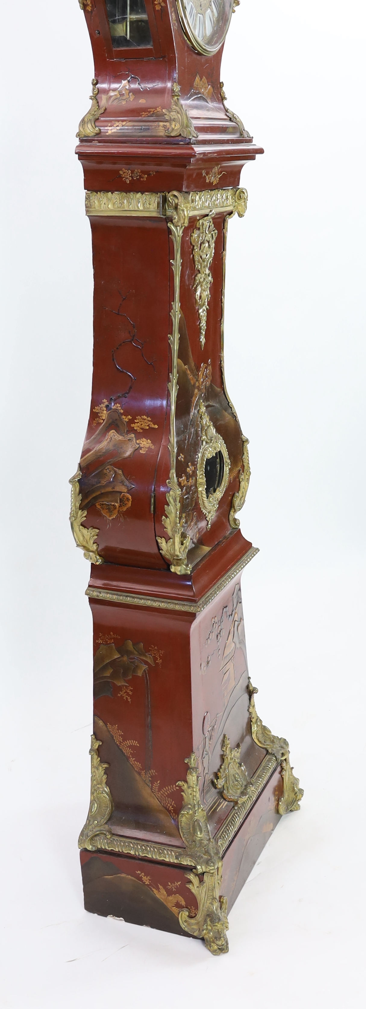 A Louis XV style ormolu mounted red chinoiserie lacquer longcase clock, 46cm wide, 33cm deep, 238cm high, Please note this lot attracts an additional import tax of 5% on the hammer price